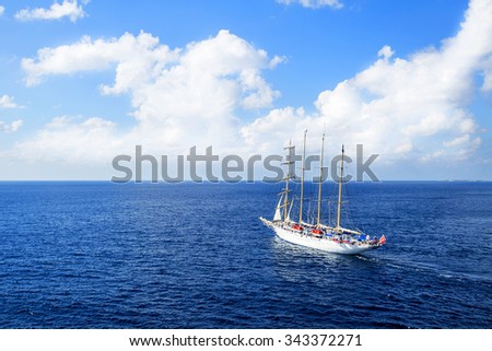 Yacht is sailing on the Caribbean sea on a sunny day.