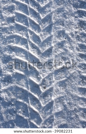 tire print on the snowy road