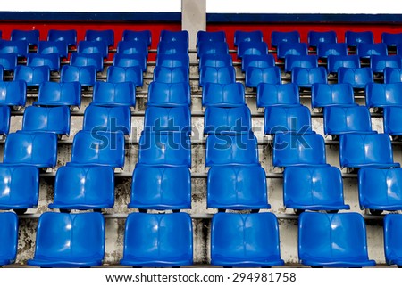 Blue seats on the stadium. Seat for watch some sport or football.