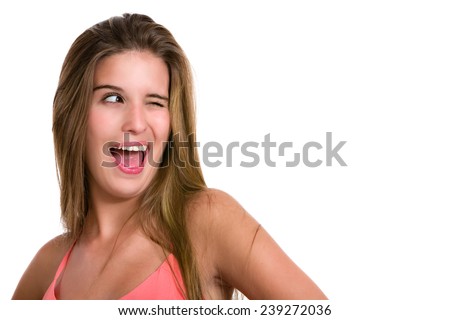 Hispanic young woman winking eye.  Image isolated on white with clipping path.