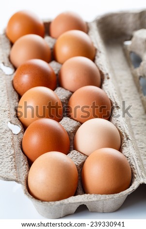 Shot of natural red eggs in retail package. Food shots.