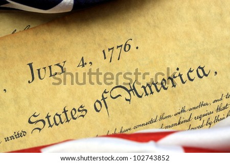 July 4, 1776 - United States of America Constitution and USA Flag.