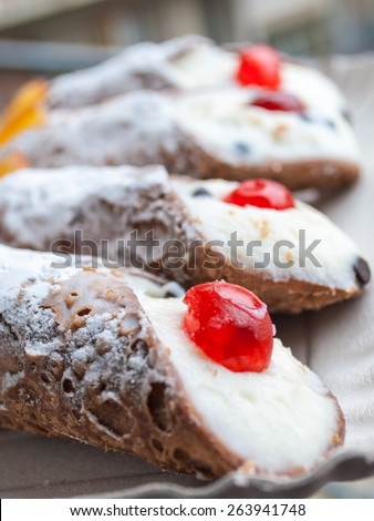 Cannoli, a typical sicilian pastry made by a cylindrical wafer filled with ricotta cheese