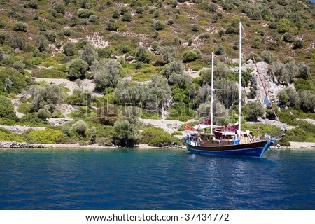 The yacht at coast of Aegean islands