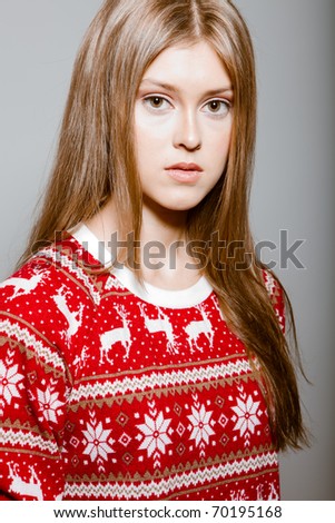 Portrait of woman with big eyes in a sweater