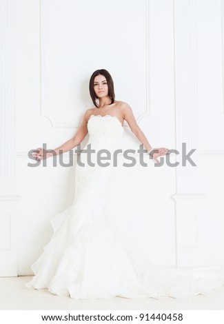 Beauty young bride dressed in elegance white wedding dress