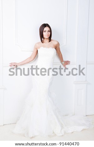 Beauty young bride dressed in elegance white wedding dress