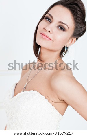 stock photo Slim beautiful woman with short hair wearing luxurious wedding