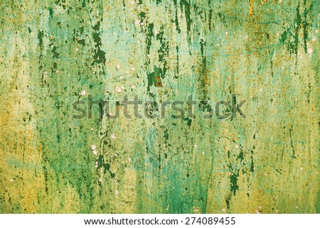 Rusty metal textured background with a light cracked paint