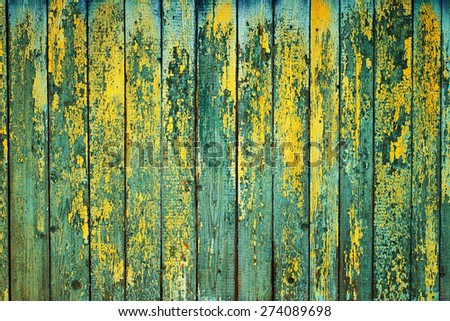 Texture of old wooden planks with peeling paint