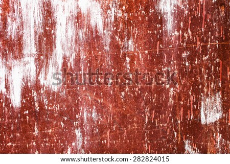 The rusty grunge iron textured background with white paint