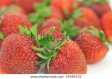 fresh ripe red strawberries, isolated on white with soft shadow