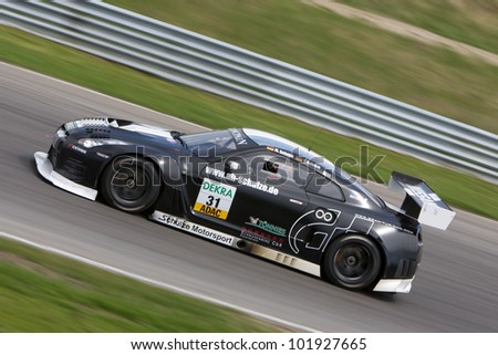 ZANDVOORT, THE NETHERLANDS - MAY 6: Tobias Schulze and Michael Schulze in the Schulze Motorsport Nissan GT-R GT3 racing on May 6, 2012 in the ADAC GT Masters in Zandvoort, The Netherlands