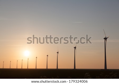 Silhouette of a Windfarm during sunset