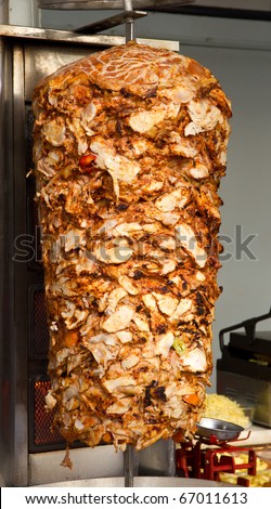 The Culture Cup Round x - Adam is a naughty naughty boy - Page 4 Stock-photo-chicken-cooking-on-rotating-vertical-spit-for-turkish-doner-kebab-67011613