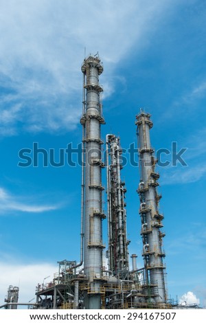 Process Columns of Natural Gas Plant with blue sky background