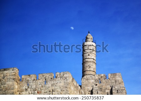 A citadel (Tower of David), half moon in the background.