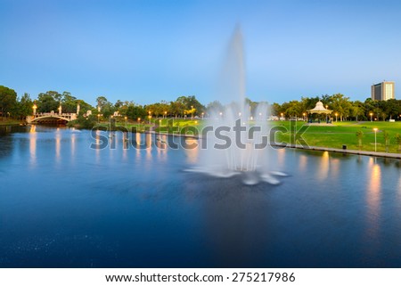 River Torrens and fountain in Elder Park at night. Long exposure effect