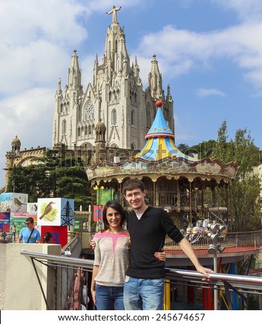 Beautiful couple on the background of expiatory Church of the Sacred Heart of Jesus