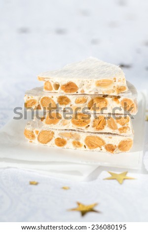 Traditional Italian (Torrone) and Spanish (Turron) Christmas Dessert, Made of Honey, Sugar, Egg Whites and Roasted Nuts