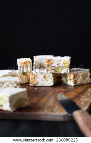 Traditional Italian (Torrone) and Spanish (Turron) Christmas Dessert, Made of Honey, Sugar, Egg Whites and Roasted Nuts