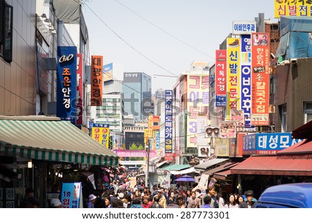 SEOUL, SOUTH KOREA - APRIL 23: People going through the Namdaemun Market in Seoul, on April 23, 2015. It is the oldest and largest market in Korea.
