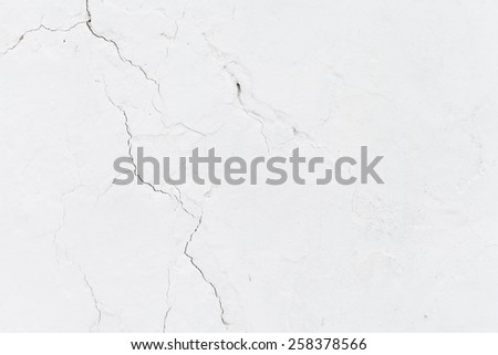 Cracked wall white background texture.