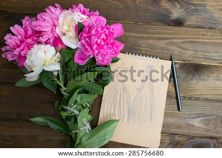 Model sketch summer with peony on white wooden background