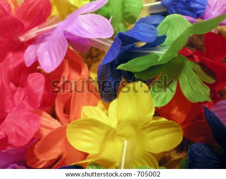 Artificial rainbow flower lei.