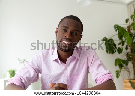 African-american man talking looking at camera, black man vacancy candidate making video call for distance job interview, dark-skinned vlogger recording videoblog, view from webcam, headshot portrait