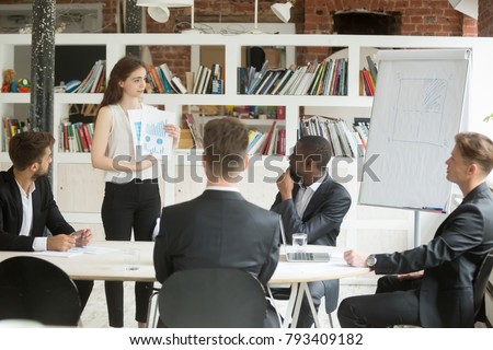 Businesswoman presenting startup design project to investors, manager designer shows clients statistics report and color swatches palette, giving presentation of work result at executive team meeting