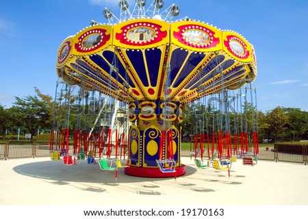 Colorful carousel in attraction park