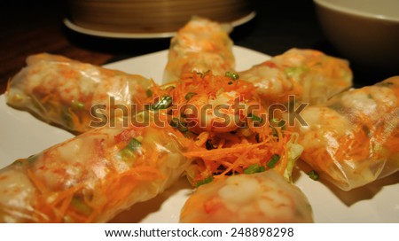 Asian dinner with rice rolls filled with shrimp