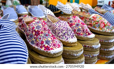 Artisan handmade shoes at market stall