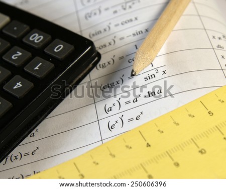 Math study for the exam set (book, pencil, calc) - Background shows trigonometry formulas