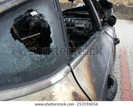 Burn sport car - broken window view