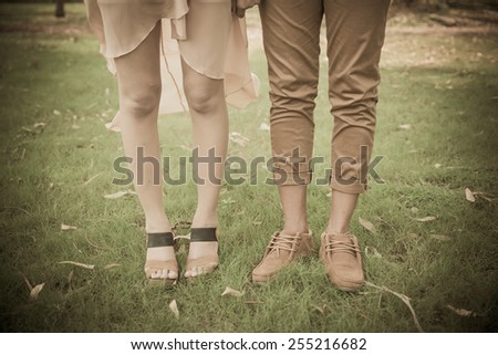 Young couple  in garden. love standing