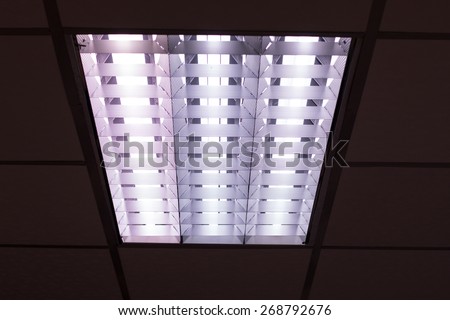 fluorescent lamp on the modern ceiling.