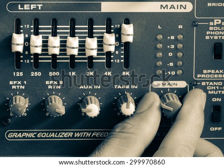 Control of high-quality audio and equalizer volume on the mixer, amplifier, old pictures.