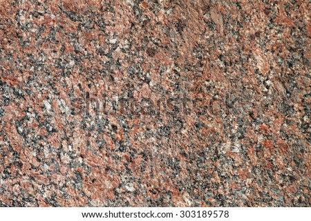 Red granite tile texture close up photo design pattern
