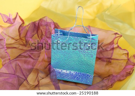 Pieces of fabrics of different colors and gift bag