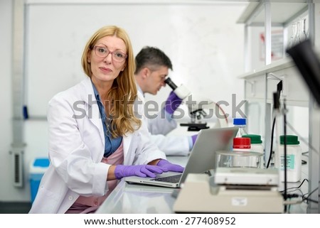 scientists work in lab