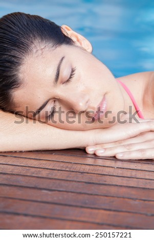 Woman sleep in the pool