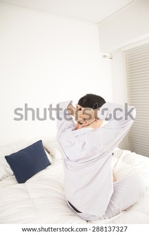Man stretching after wake up