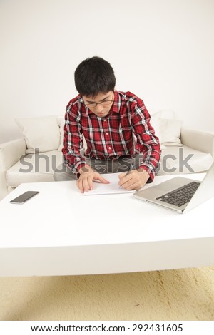 Man writing a letter