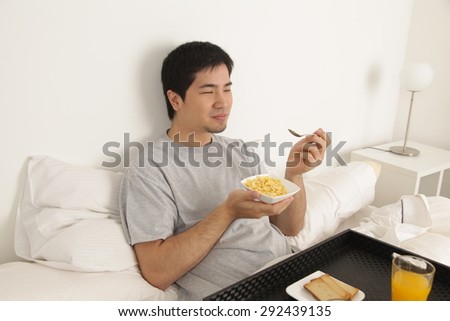 Man eating cereals