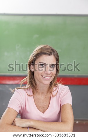 The teacher looking at camera
