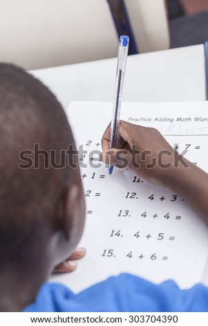 Boy doing the activity of math