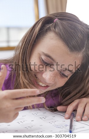 Girl doing the exercise of math