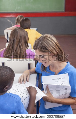 The teacher teaching to pupil
